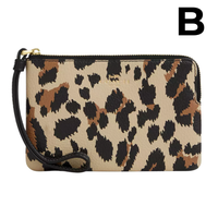 Corner Zip Wristlet With Signature Canvas **PREVENTA**